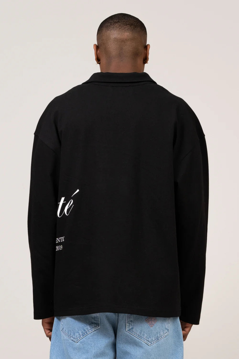 TEUN LONGSLEEVE POLO • BLACK