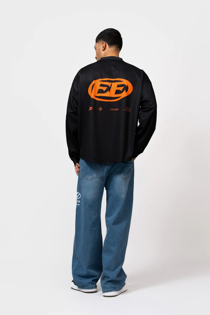 ARENA LONGSLEEVE SHIRT ZWART/ORANJE