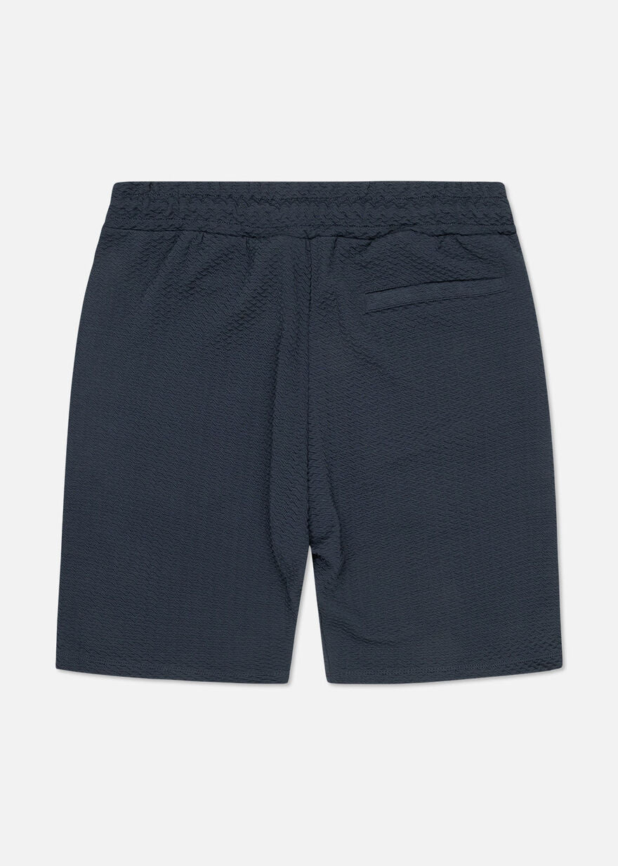 OFF THE PITCH BOULEVARD SHORTS - MIDNIGHT NAVY